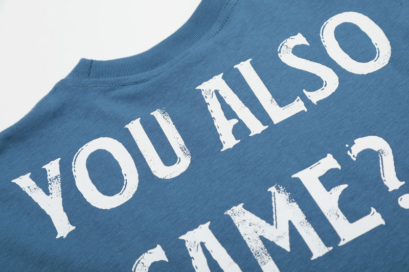 Blue oversized graphic T-shirt with distressed white Lonely Happy print on the back neckline area