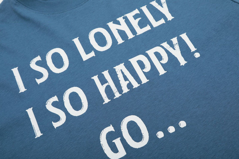 Blue oversized graphic T-shirt with distressed white text print reading I So Lonely I So Happy Go...