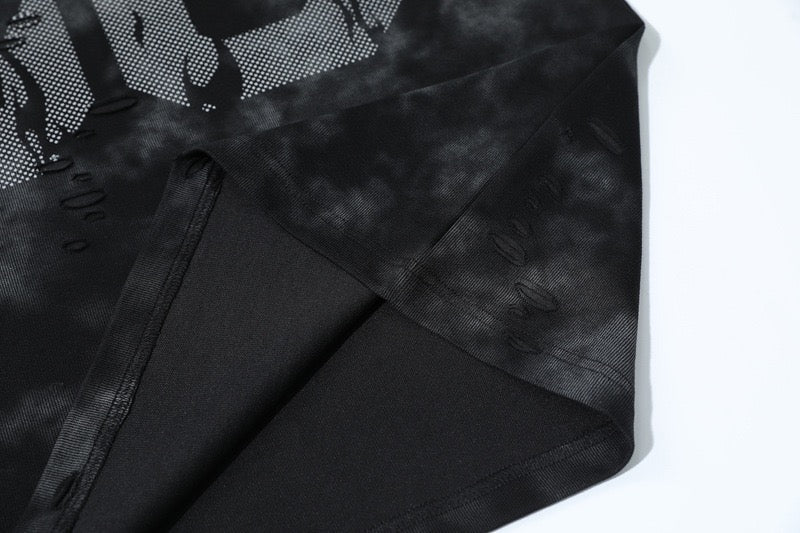 Black marble-wash oversized tee with distressed number graphic and textured streetwear details