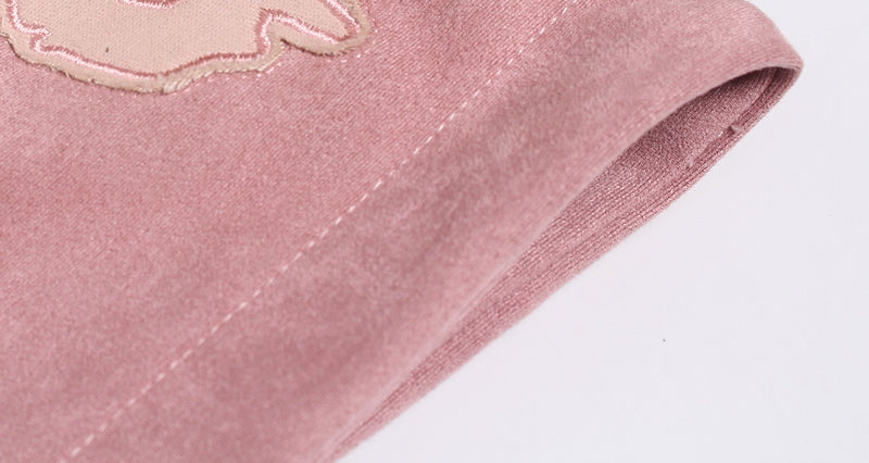 Close-up of pink hoodie sleeve opening and seam stitching