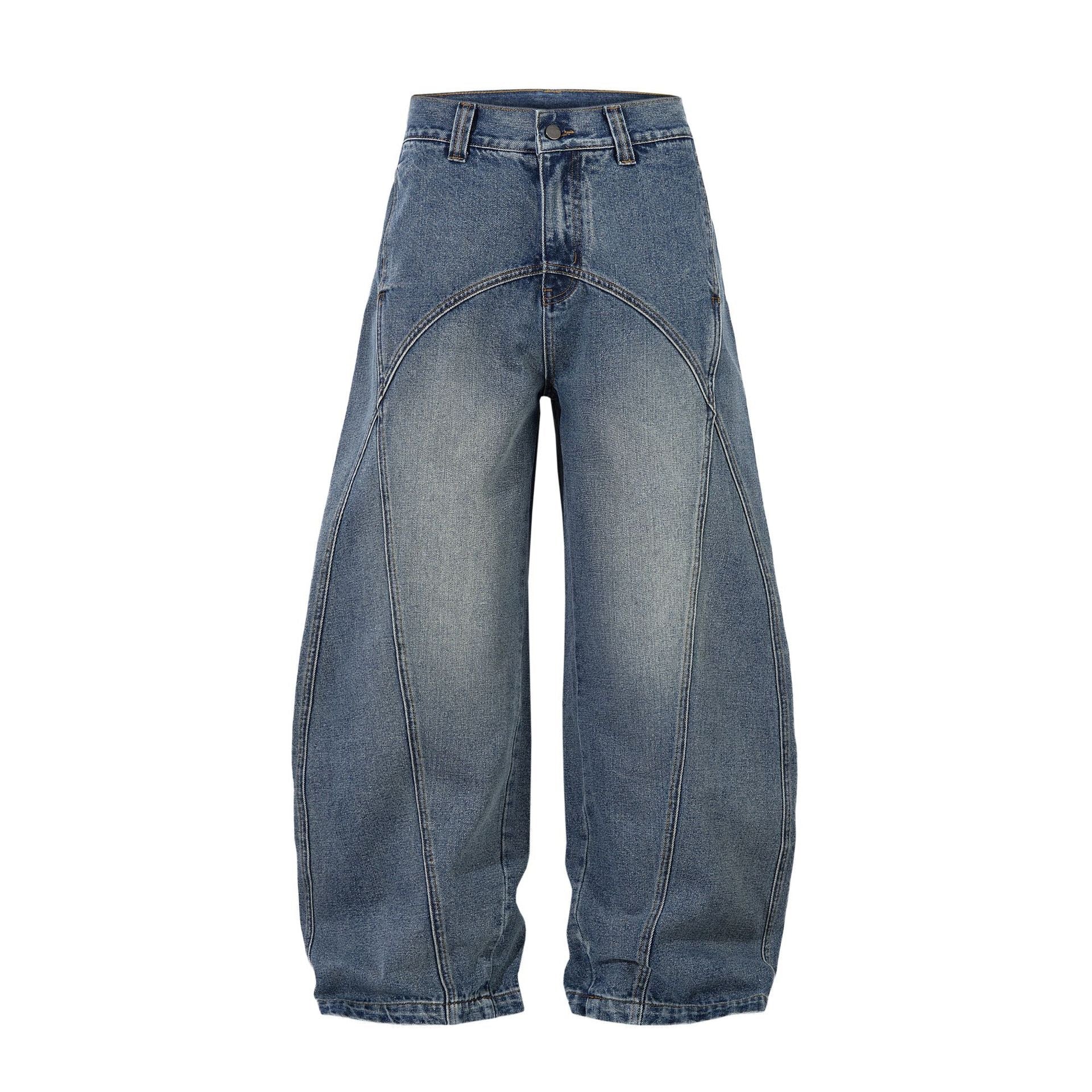 Front view of Omirad Curved Blade Wide-Leg Jeans in washed blue denim with curved seam detailing