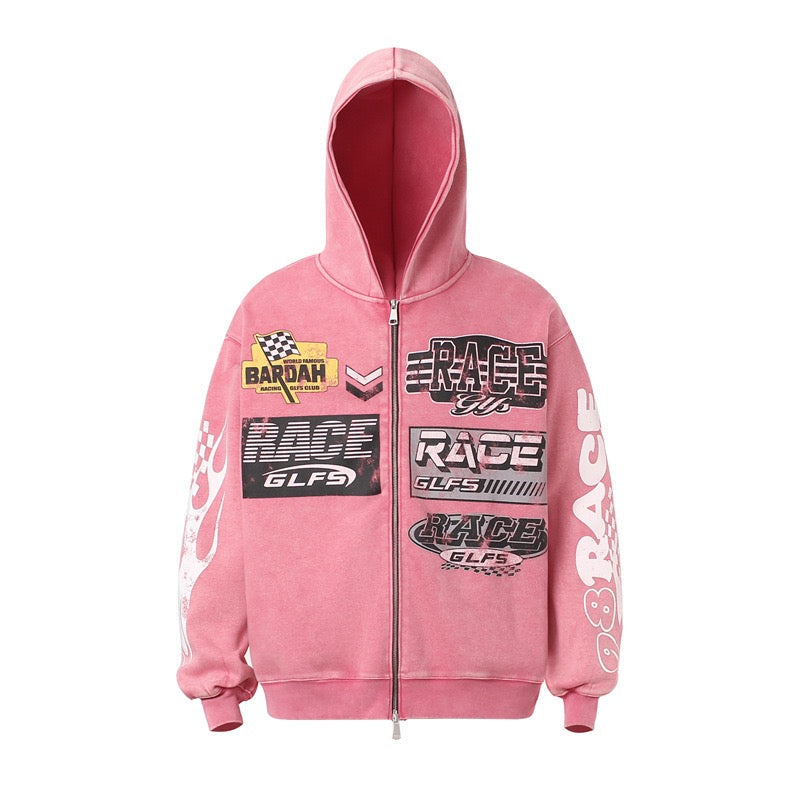 Front view of pink zip hoodie with racing graphic prints and sleeve text