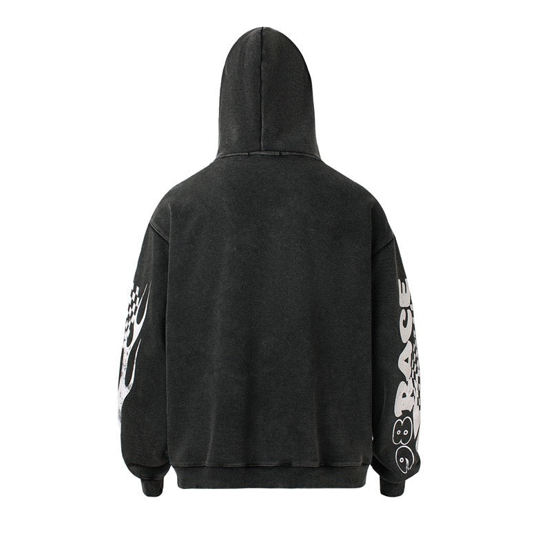 Back view of black zip hoodie with racing graphics on the sleeves
