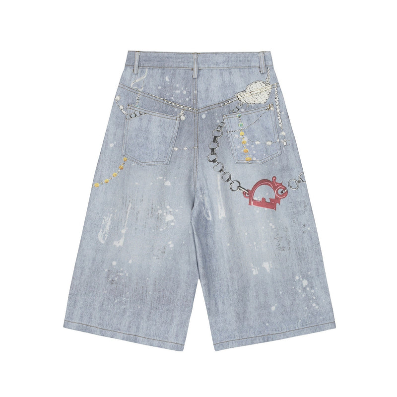 Back view of light wash wide-leg denim shorts with chain print and red heart graphic