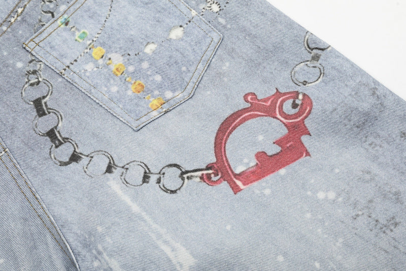 Close-up of back seat area on light wash denim shorts with red heart chain graphic