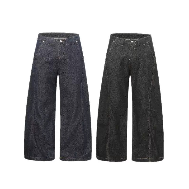 Omirad wide-leg cotton denim pants in raw black wash with contrast panel stitching and button closure, front view