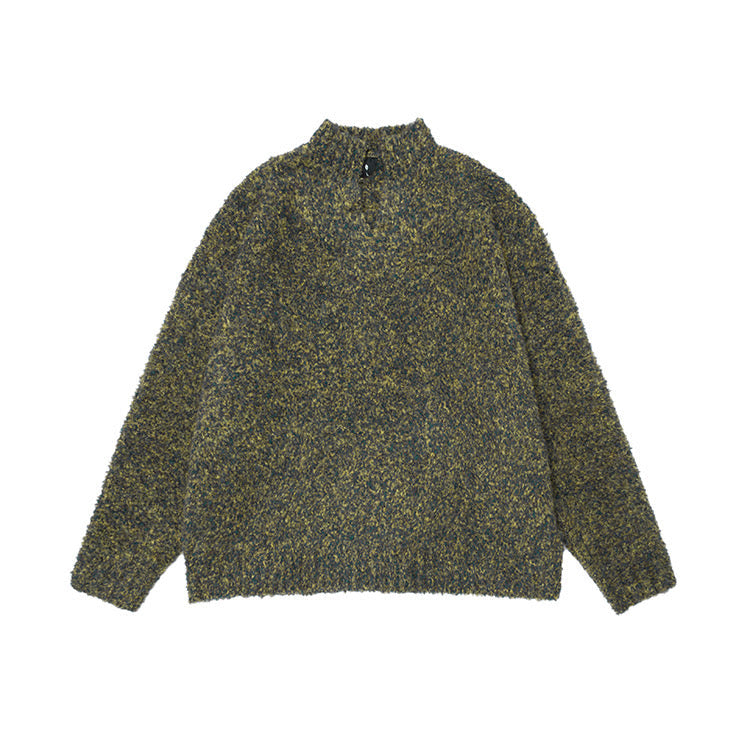 Dark speckled boucle knit sweater laid flat with half-zip collar and long sleeves