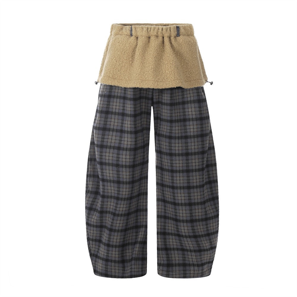 Front view of dark grey plaid wide-leg pants with camel sherpa fleece layered waistband and adjustable drawcords