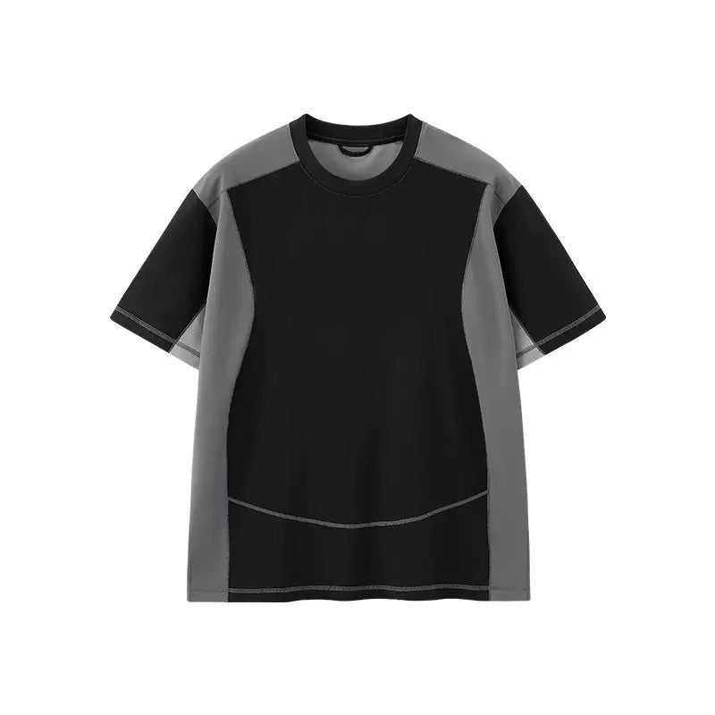 Flat lay of a black and grey color-block panel cotton t-shirt with curved contrast seam detailing and crew neckline
