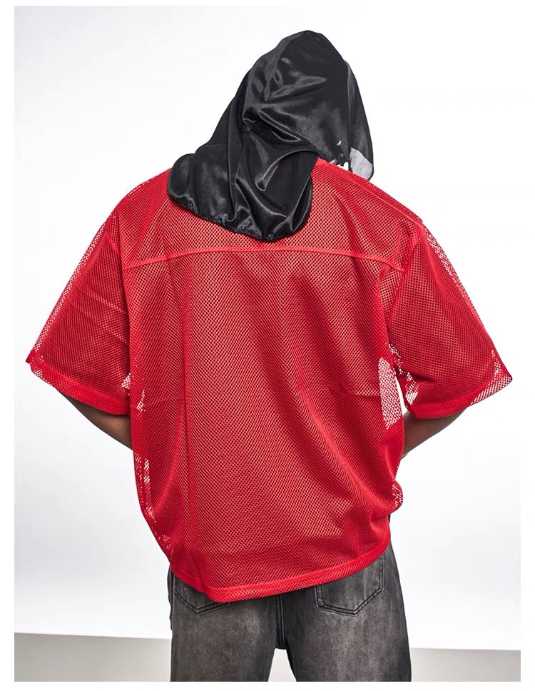 Red mesh jersey tee with oversized fit, black hooded scarf detail, and varsity streetwear style from the back