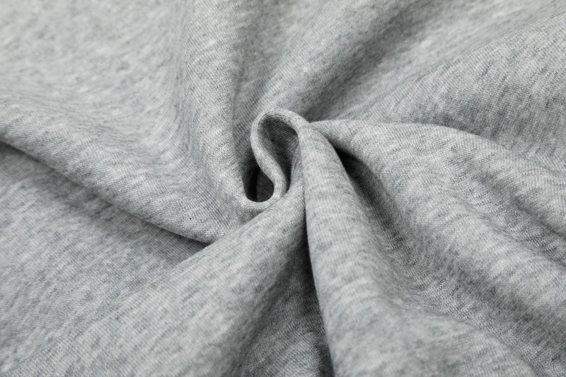 Close-up of gray hoodie fabric texture and seam detail