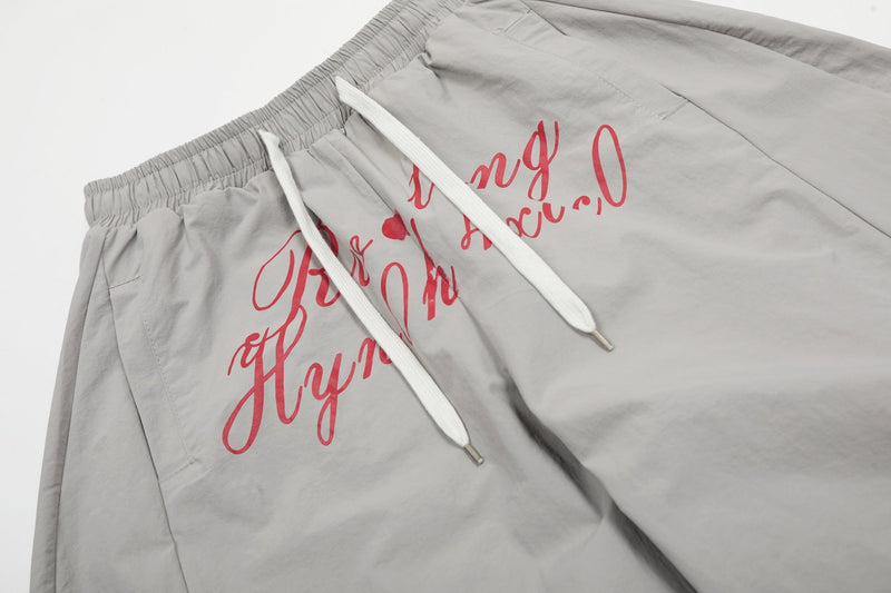 Script Graphic Nylon Wide-Leg Balloon Pants | SEAKOFF