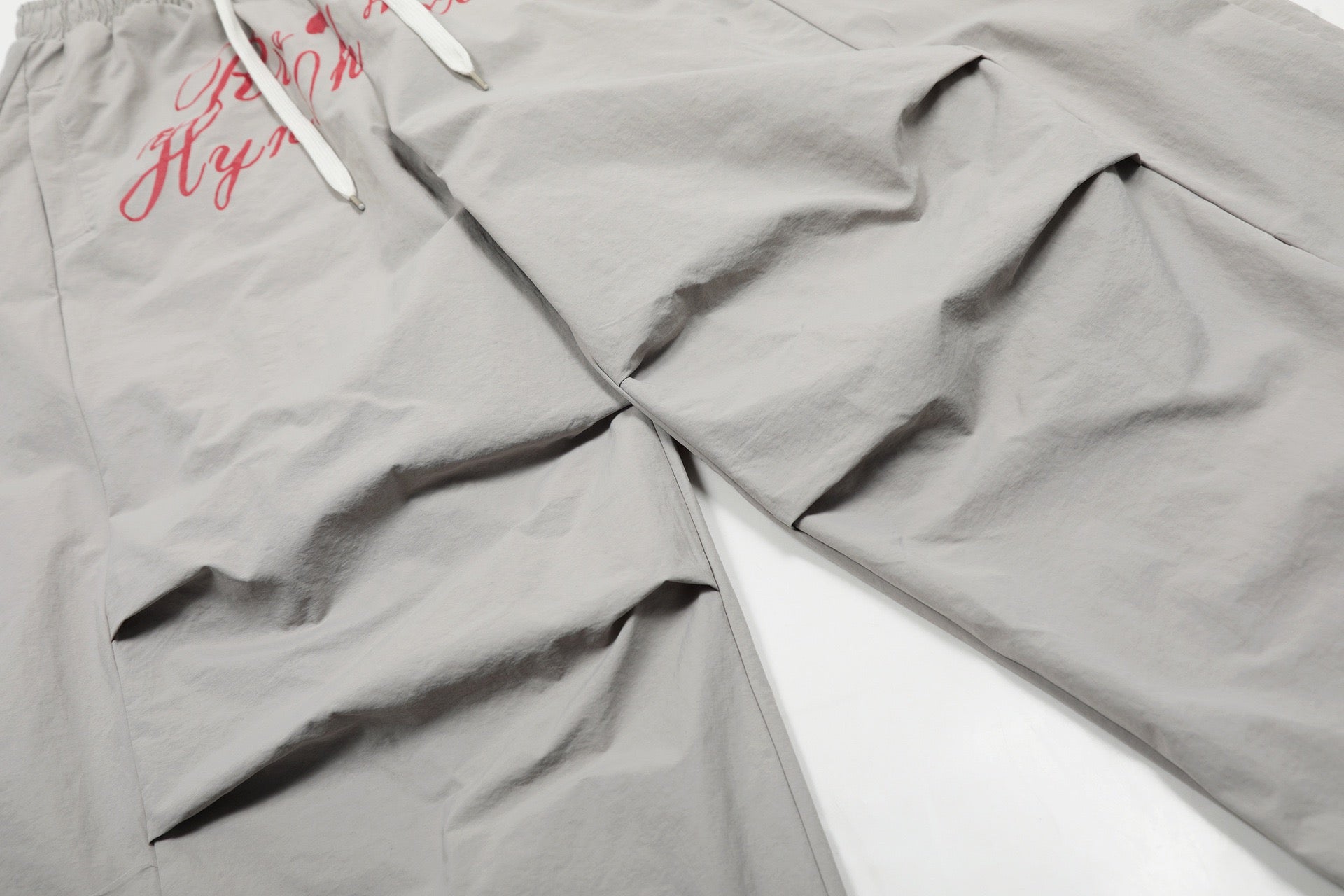 Script Graphic Nylon Wide-Leg Balloon Pants | SEAKOFF