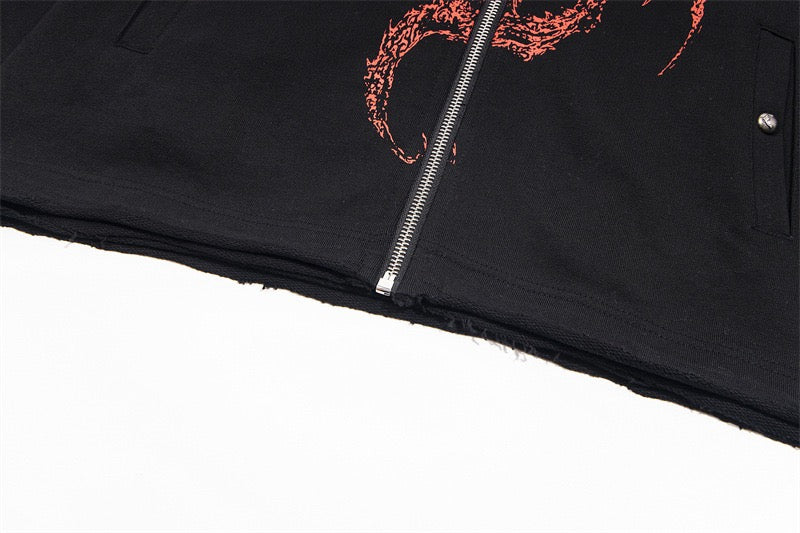Close-up of black hoodie hem and front zipper with red dragon print