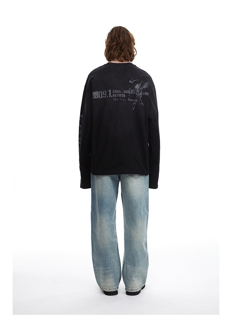 Black distressed number graphic long-sleeve tee worn on back view with oversized fit