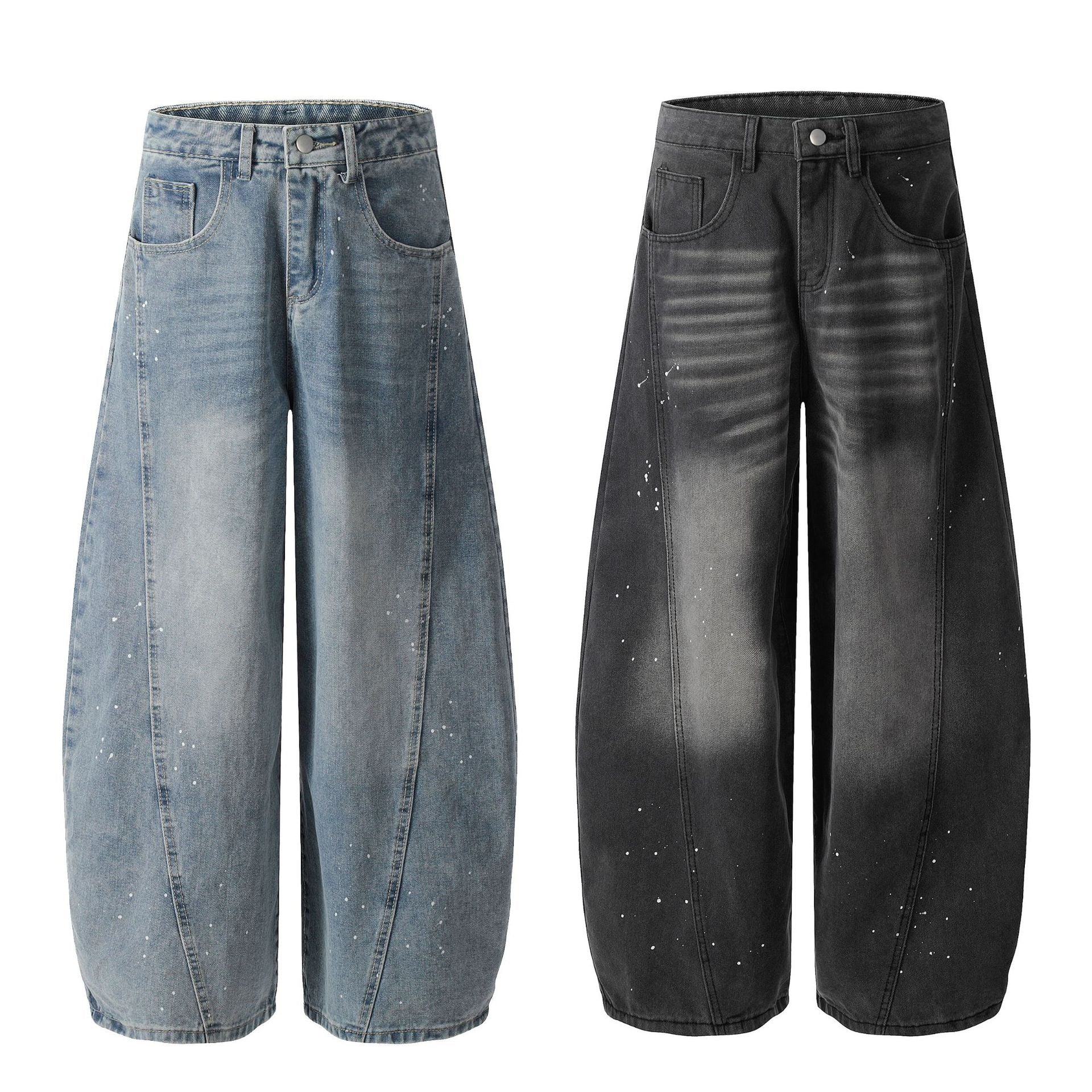 Front view of light blue and washed black paint-splatter curved wide-leg balloon denim jeans displayed side by side