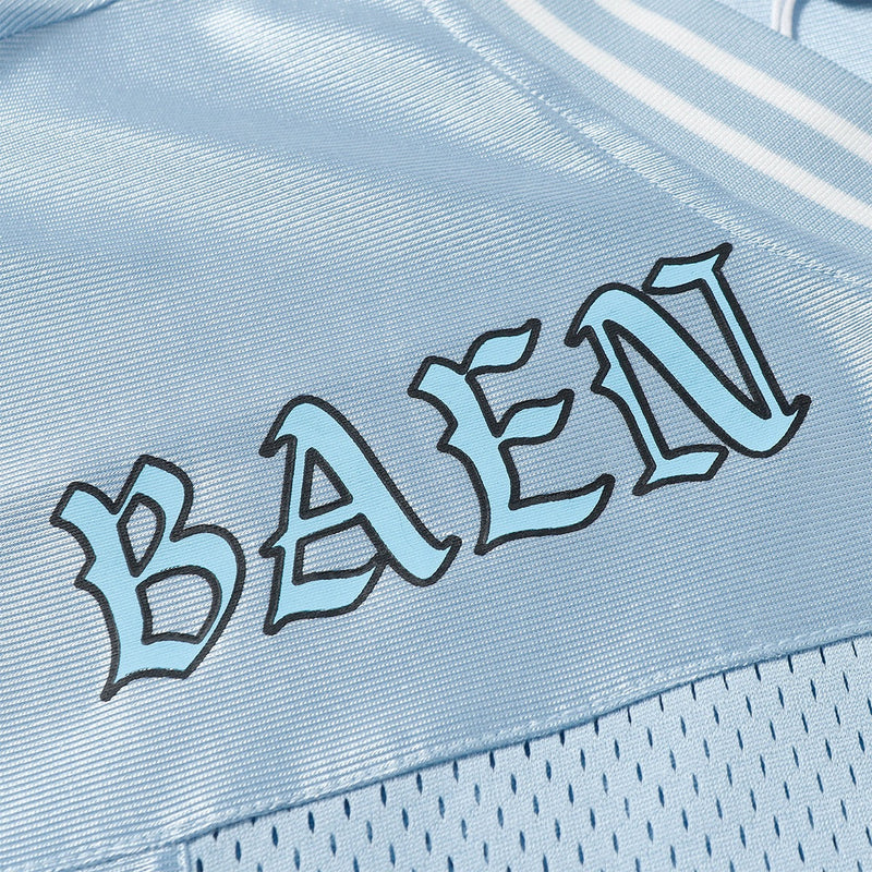 Light blue mesh varsity jersey tee with bold BAEEN lettering and striped shoulder detail