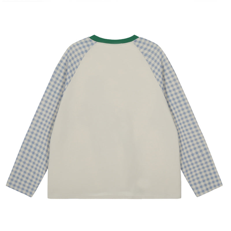 Back view of cream raglan long-sleeve tee with blue gingham sleeves and green neckline