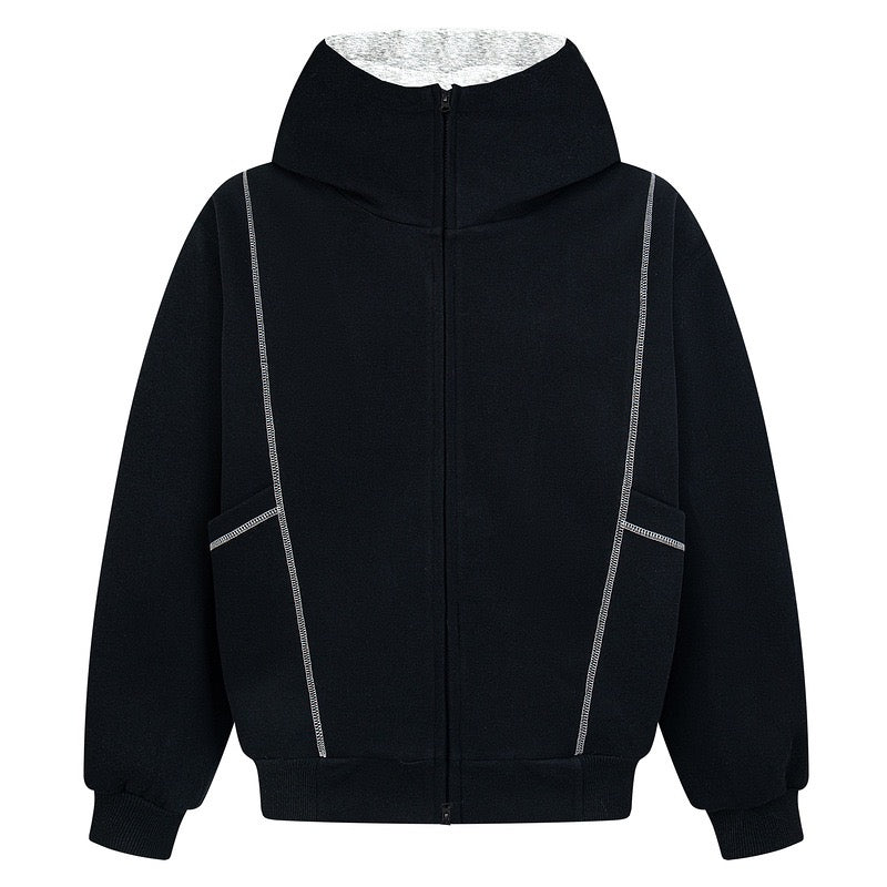 Black zip-up hoodie with contrast seam panel detailing on front, grey marl hood lining, relaxed street fit