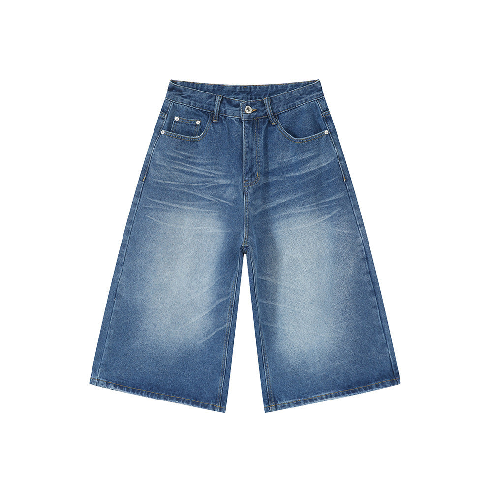 Omirad wide-leg denim shorts in washed blue with five-pocket construction and relaxed knee-length fit
