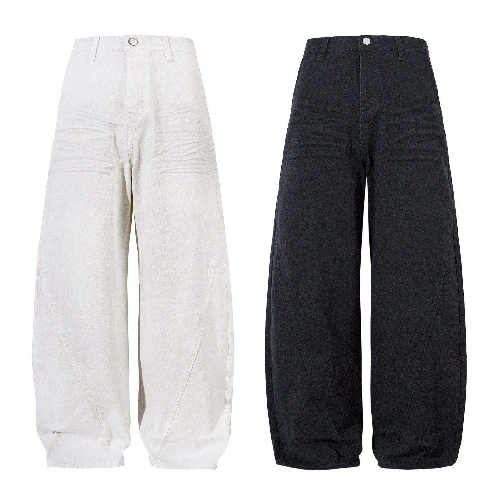 Omirad curved wide-leg pants in off-white and charcoal black, showing oversized barrel-leg silhouette with curved seam detail