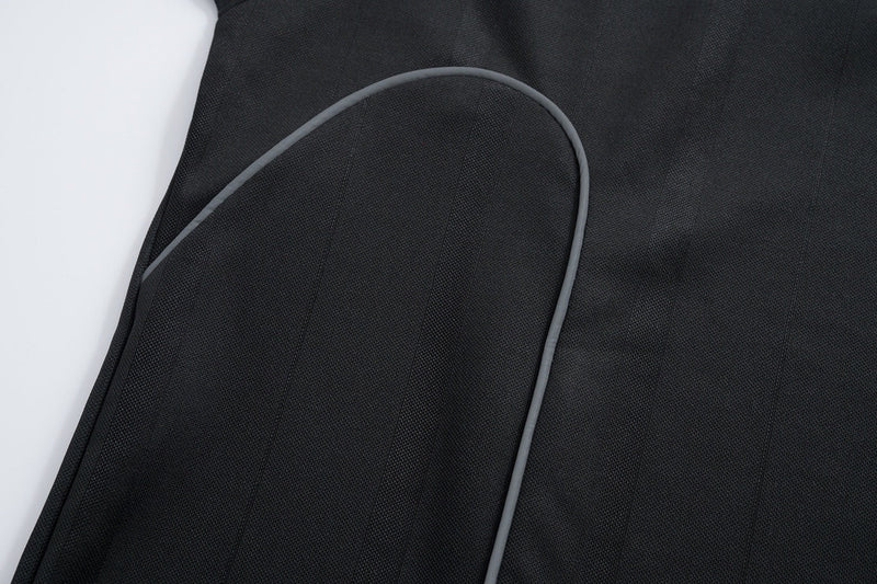 Black mesh athletic tee with gray piping and visible triple-stripe seam detail on the sleeve, close-up view