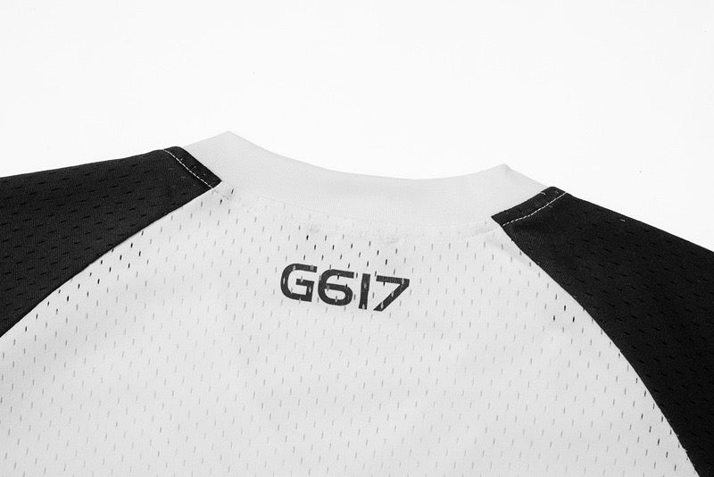 Close-up of back neck label on white mesh jersey with GG17 print