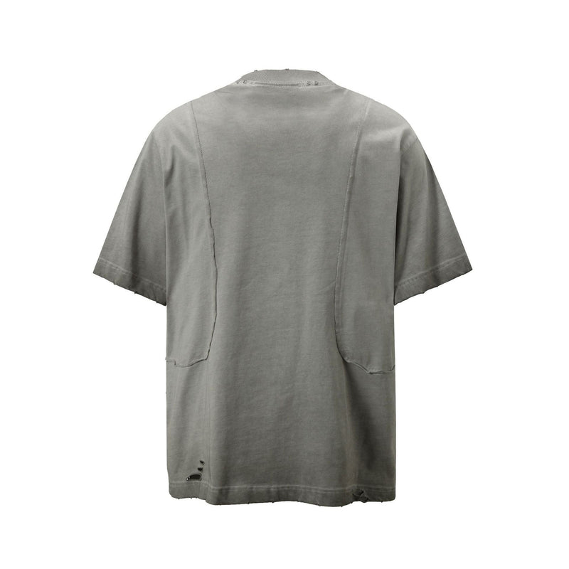 Gray washed cotton tee with distressed panel seams and raw hem, shown from the back on a clean white background