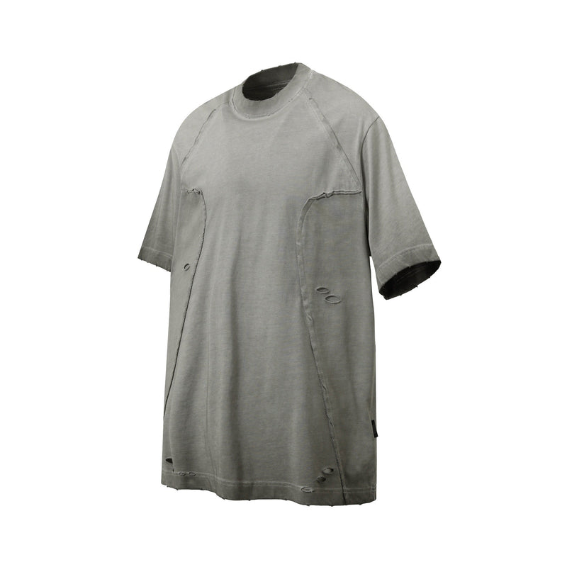 Gray distressed oversized panel tee with raw seams, short sleeves, and washed cotton streetwear style
