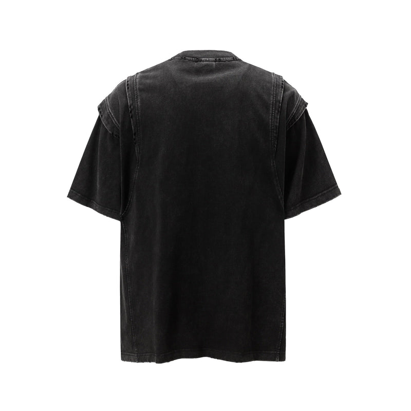 Black washed panel tee with oversized short sleeves and distressed vintage streetwear styling, back view on white background