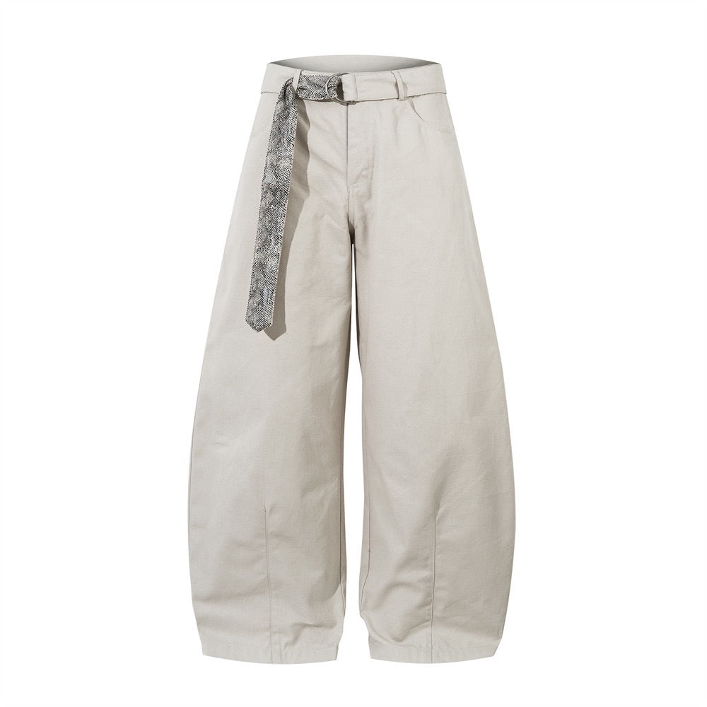 Light stone barrel-leg pants with detachable snakeskin-pattern belt, front view on white background