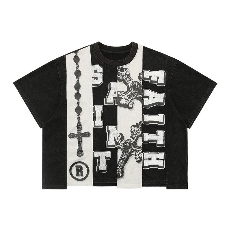 Black cropped boxy graphic tee with contrast white panel, Saint Faith gothic typography and rosary cross print on front