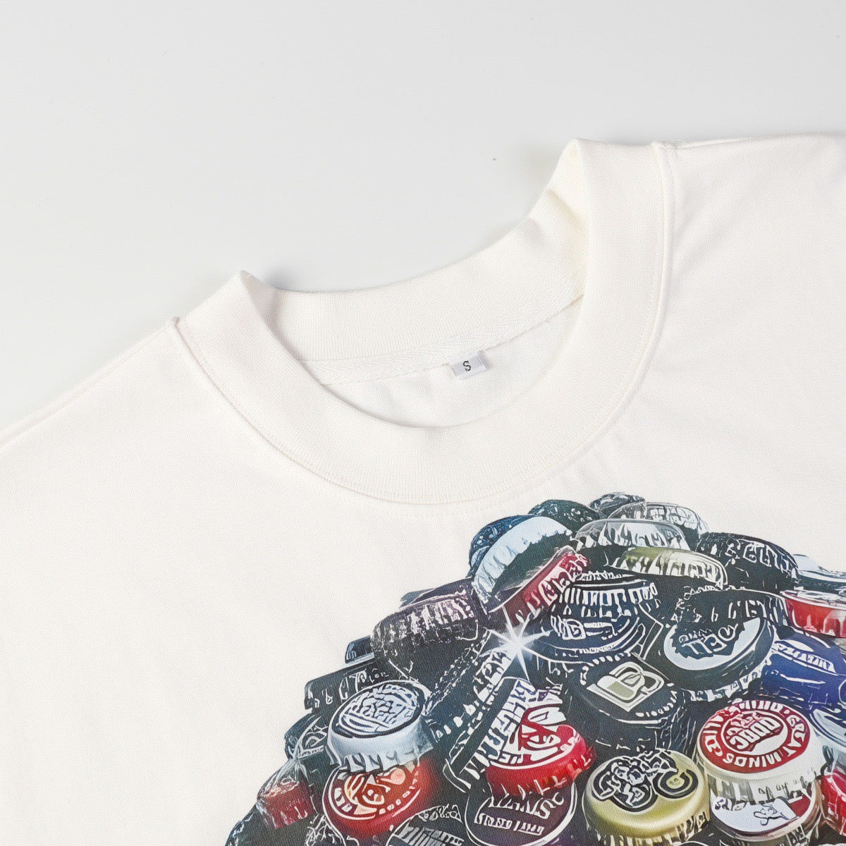 Saint Crown Bottle Cap Portrait Graphic Tee | Streetwear