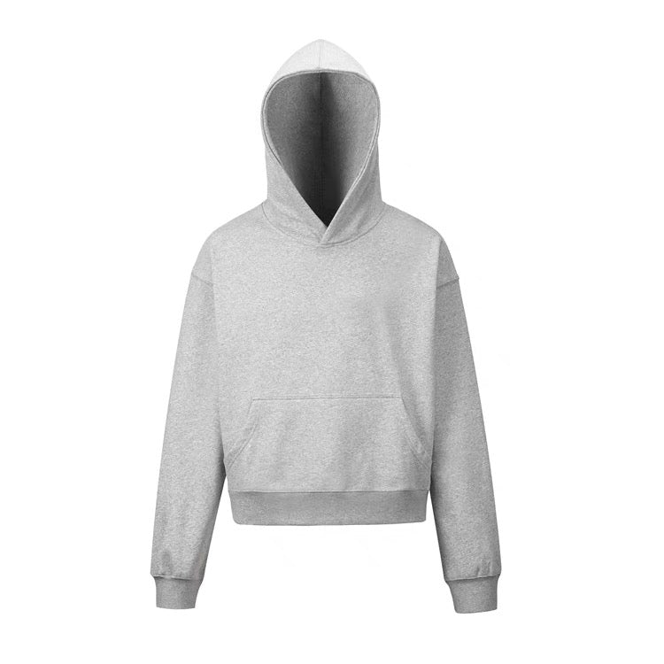 Heather grey minimal crop hoodie with structured hood, dropped shoulders, and front kangaroo pocket on white background