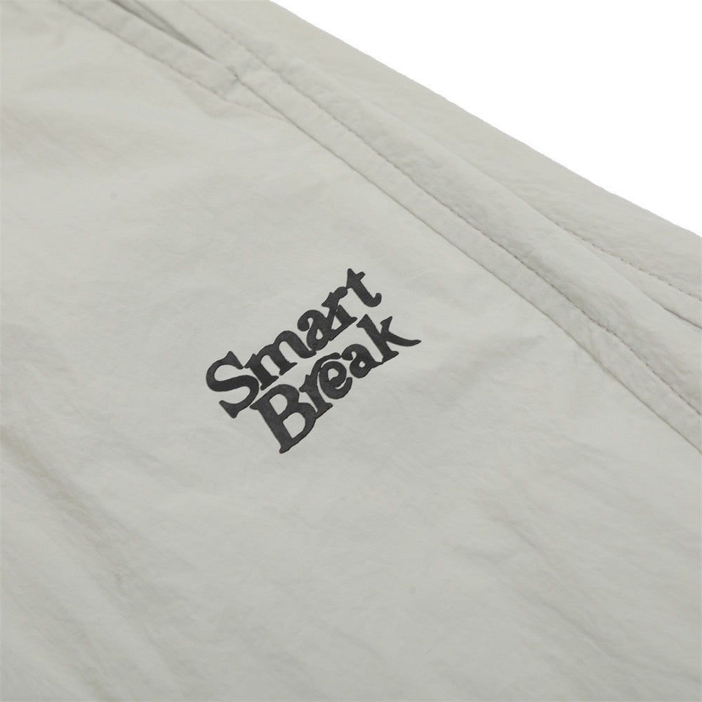 Smart Break Wide-Leg Nylon Track Pants | Cream & Black