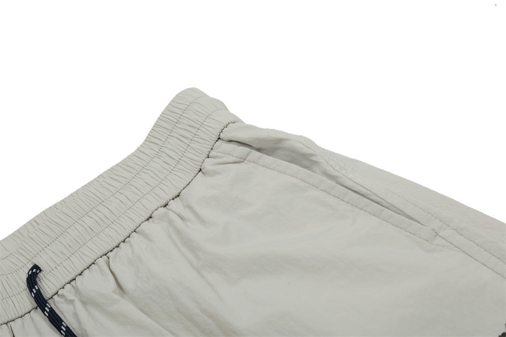 Smart Break Wide-Leg Nylon Track Pants | Cream & Black