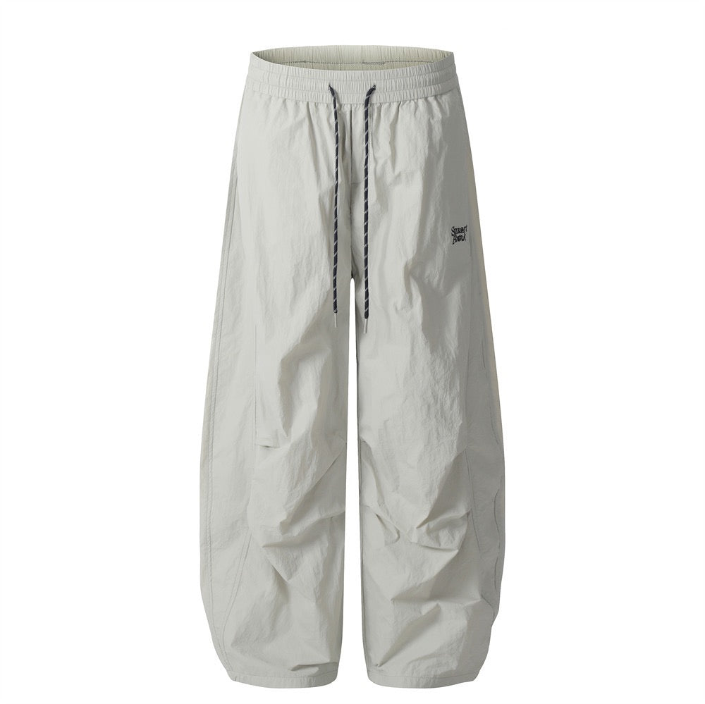Smart Break Wide-Leg Nylon Track Pants | Cream & Black