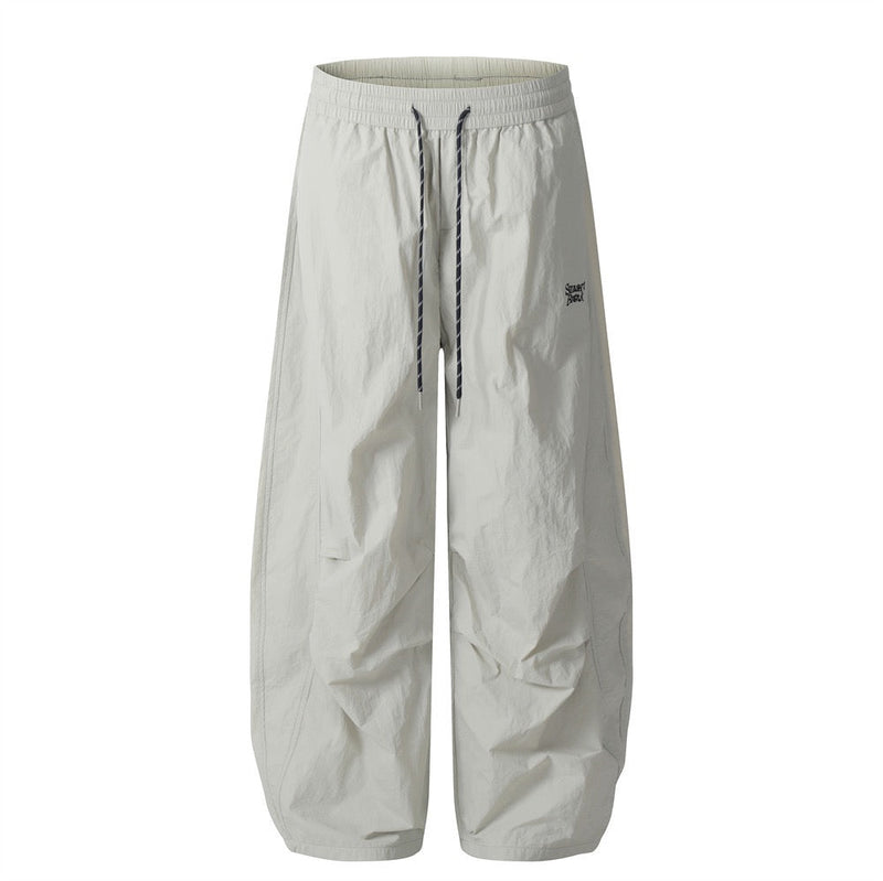 Smart Break Wide-Leg Nylon Track Pants | Cream & Black