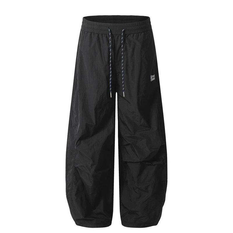 Smart Break Wide-Leg Nylon Track Pants | Cream & Black