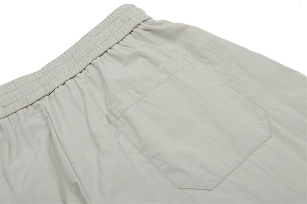 Smart Break Wide-Leg Nylon Track Pants | Cream & Black
