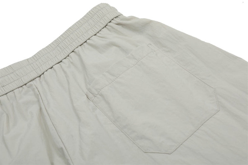 Smart Break Wide-Leg Nylon Track Pants | Cream & Black