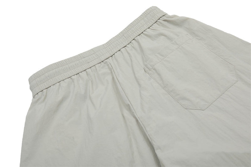 Smart Break Wide-Leg Nylon Track Pants | Cream & Black