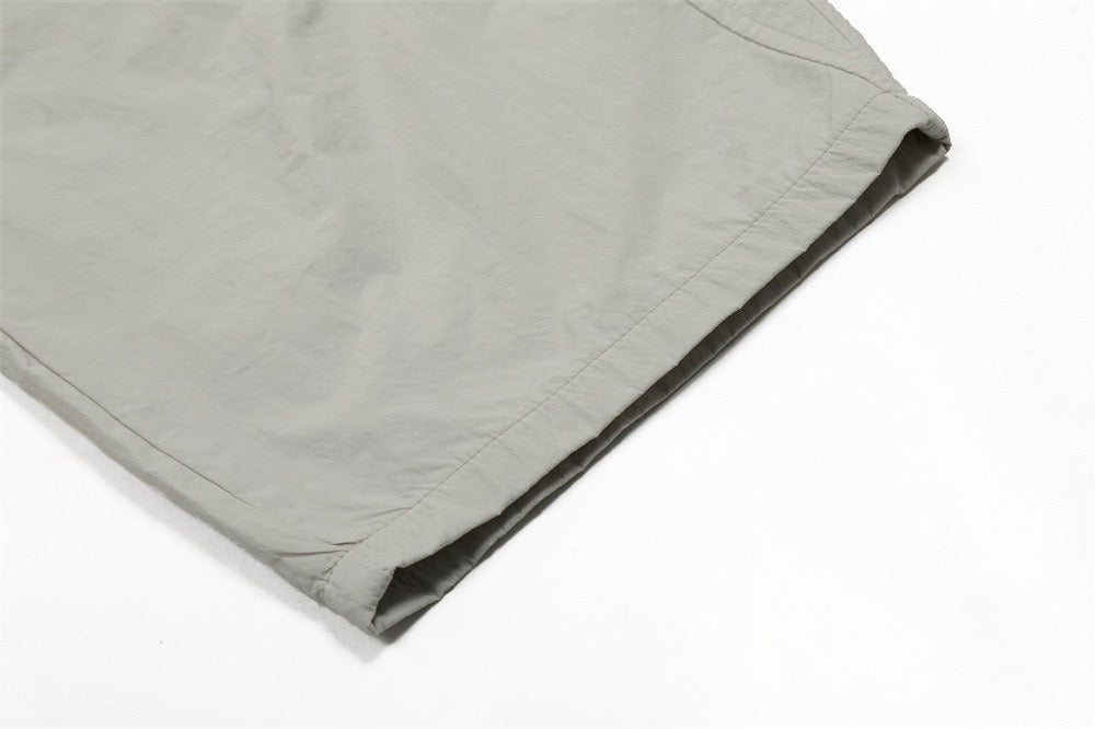 Smart Break Wide-Leg Nylon Track Pants | Cream & Black