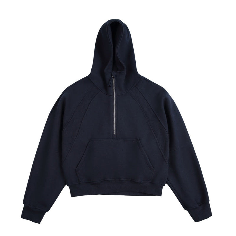 Navy blue half-zip cropped hoodie with hood and kangaroo pocket, front view