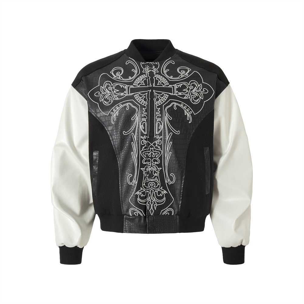 Black and white gothic cross panel bomber jacket with embossed faux-croc texture and ornate white cross embroidery on front
