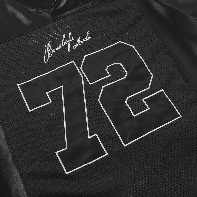 Black mesh football jersey tee with large white outlined 72 and script logo on the chest, streetwear style