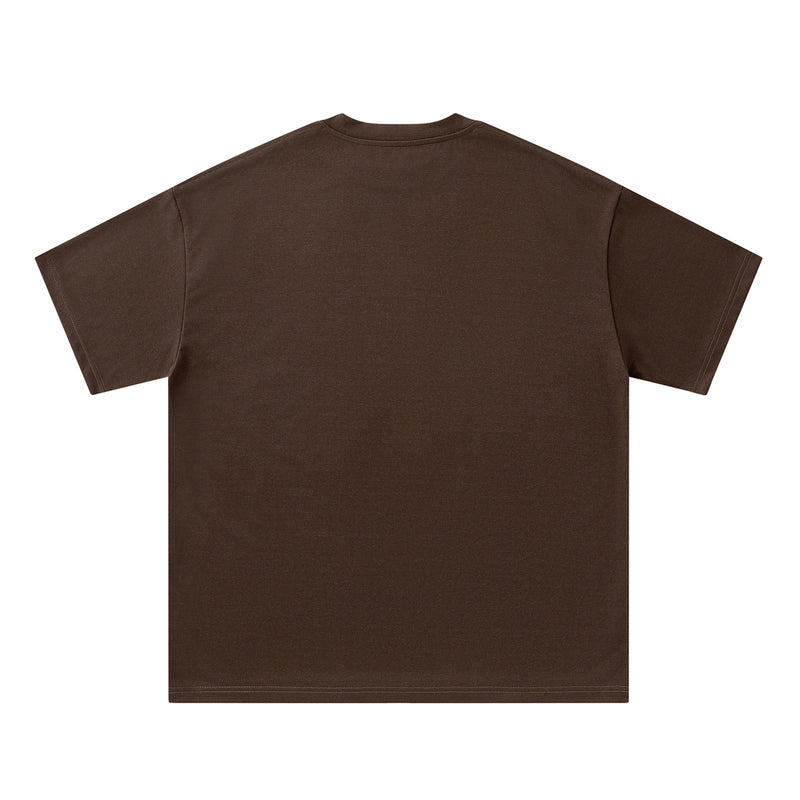 Brown oversized cotton T-shirt shown from the back with a relaxed fit and short sleeves on a clean white background