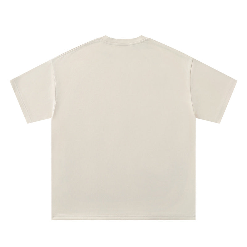 Cream oversized cotton T-shirt shown from the back with short sleeves and a relaxed, boxy fit