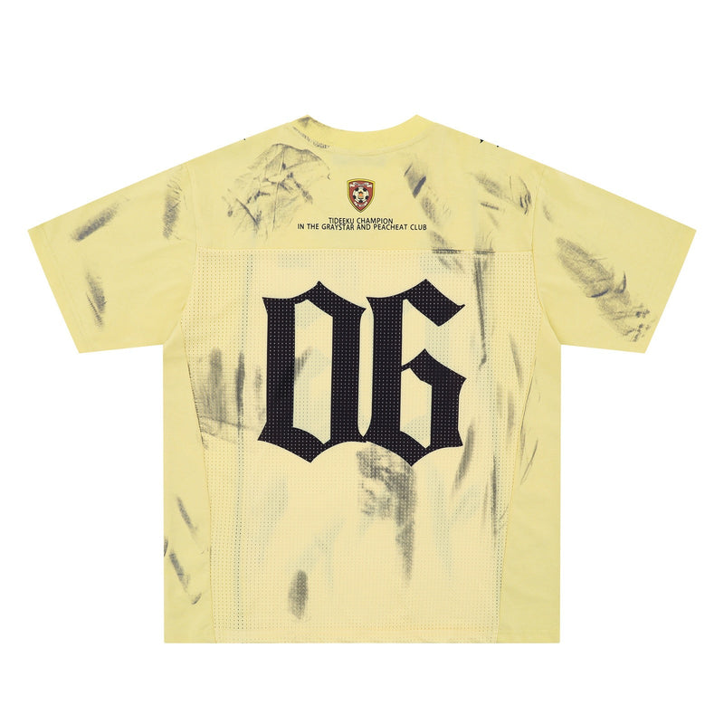 Yellow washed athletic mesh jersey tee with black oversized OG 06 graphic and distressed print details