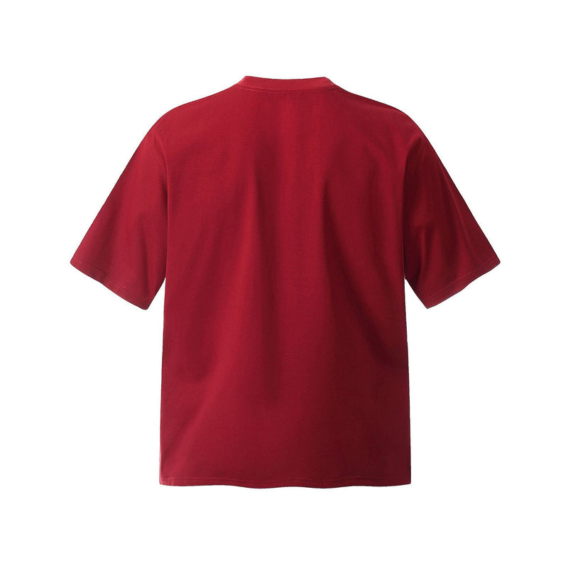 Back view of a deep red streetwear tee with a relaxed fit and plain solid design on a white background